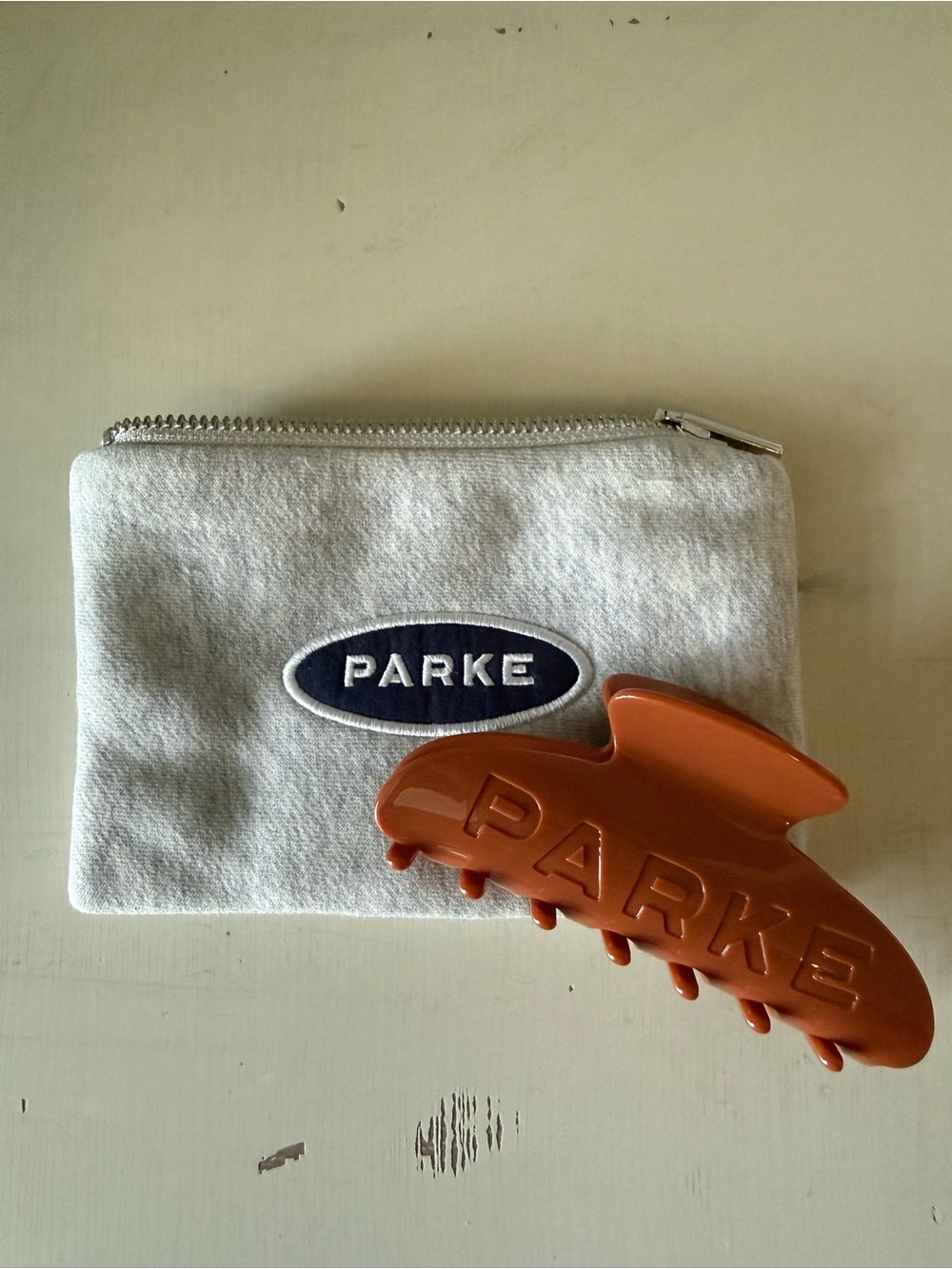 Parke clip and pouch • NWT • Burnt Orange
